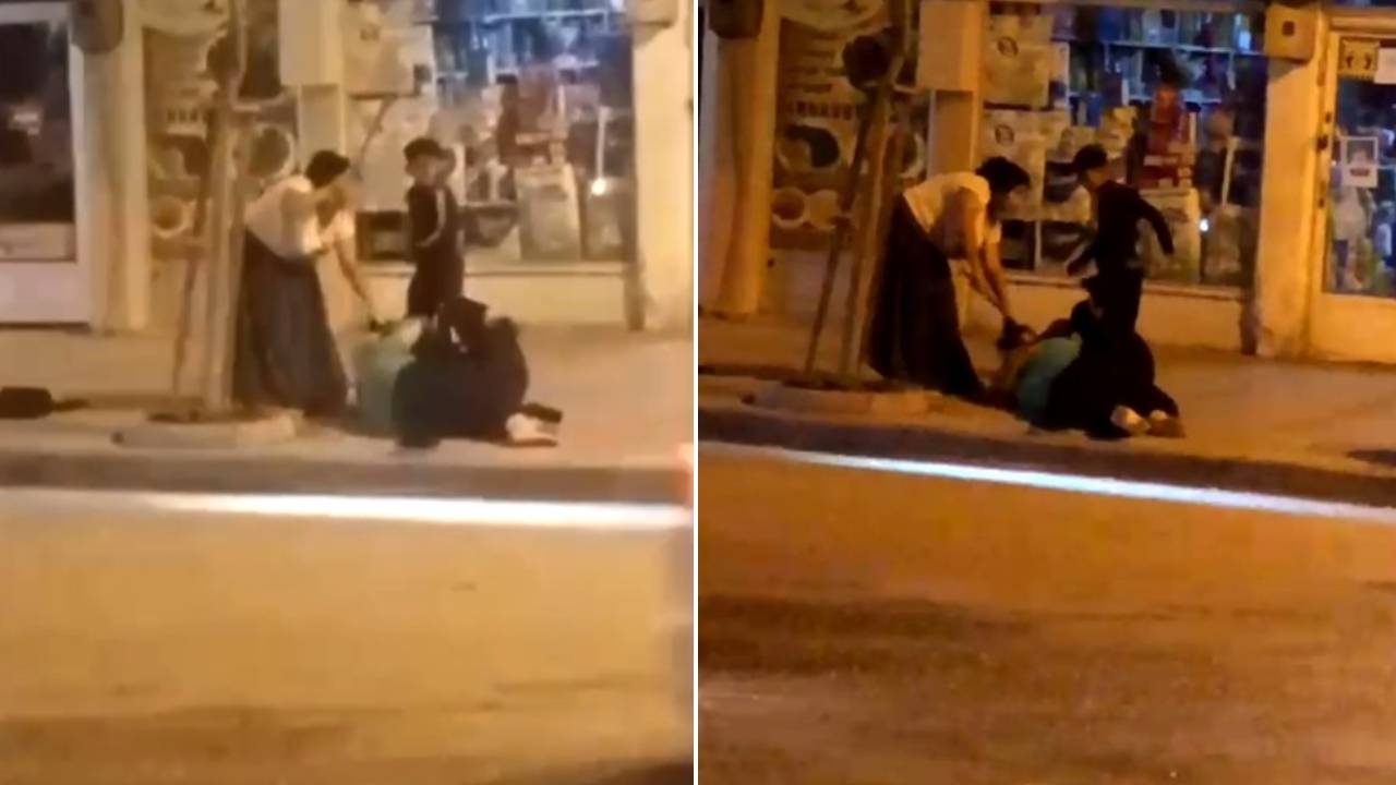 Karabük’te caddede iki kadının sopalı kavgası kamerada